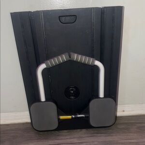 Black and Gray Exercise Equipment Pilates board